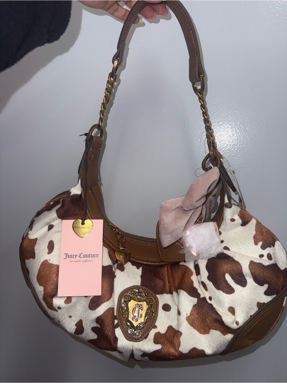 Juicy Couture Juicy Romance  Cow Hobo/Coho in the color Saddle